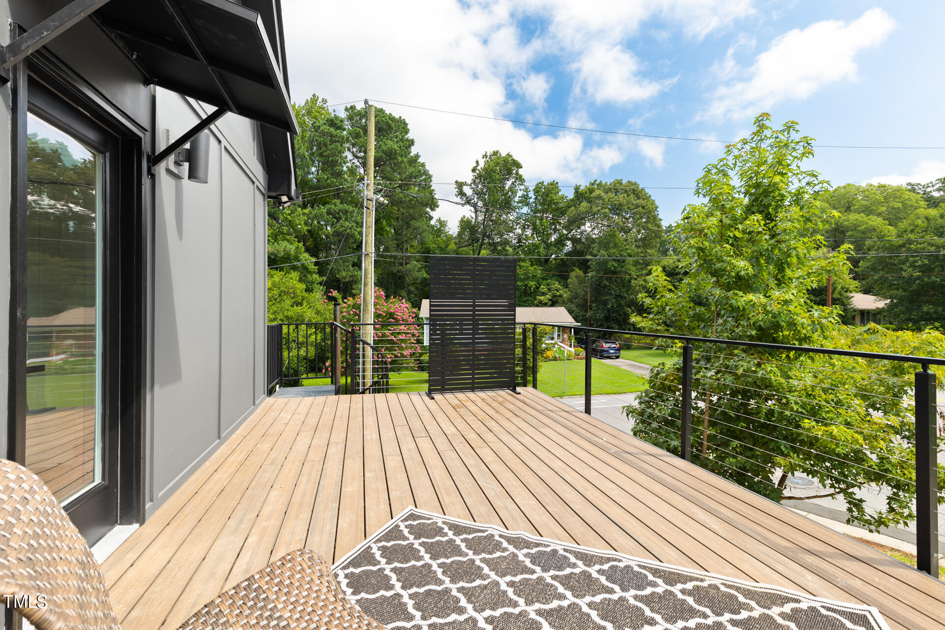 2909 Herring Boulevard Durham, NC 27704 - Photo 41 of 47 a view of balcony with wooden floor and fence