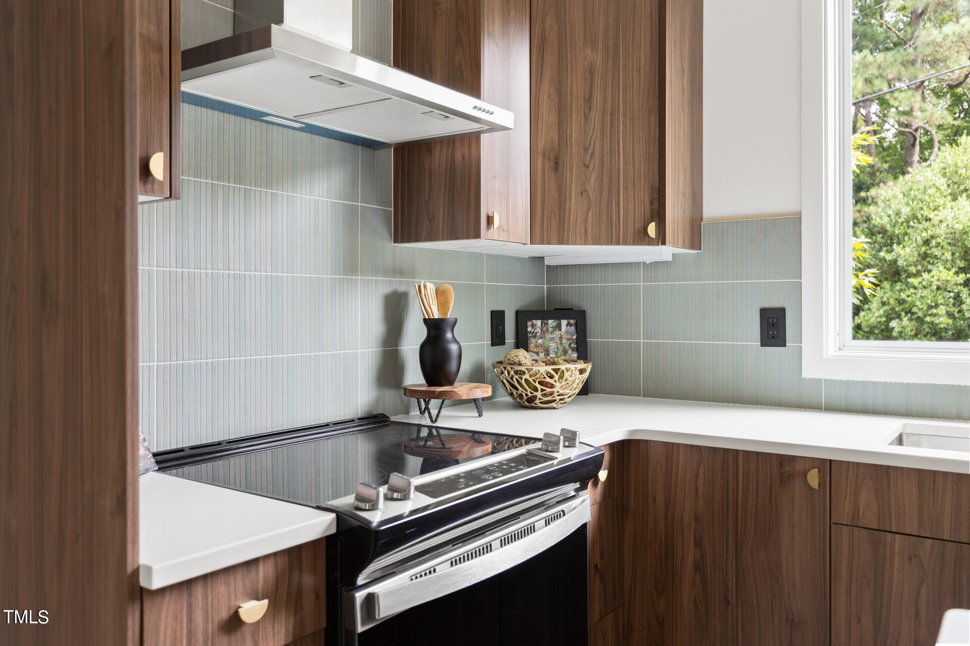 2909 Herring Boulevard Durham, NC 27704 - Photo 6 of 47 a kitchen with a sink and a stove top oven