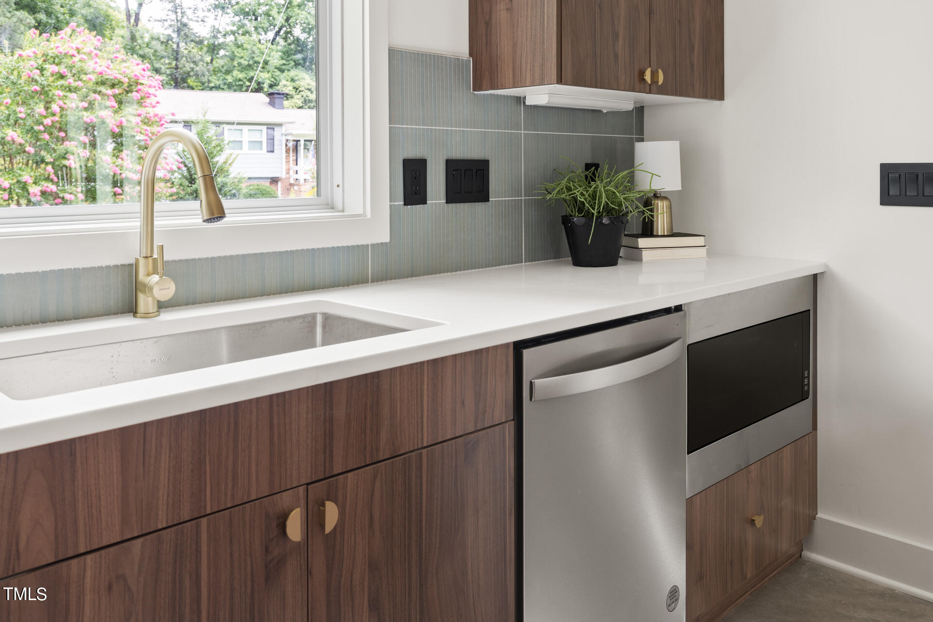 2909 Herring Boulevard Durham, NC 27704 - Photo 8 of 47 a kitchen with a sink and a window