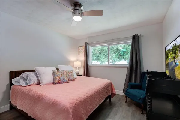 a kitchen with sink and cabinets