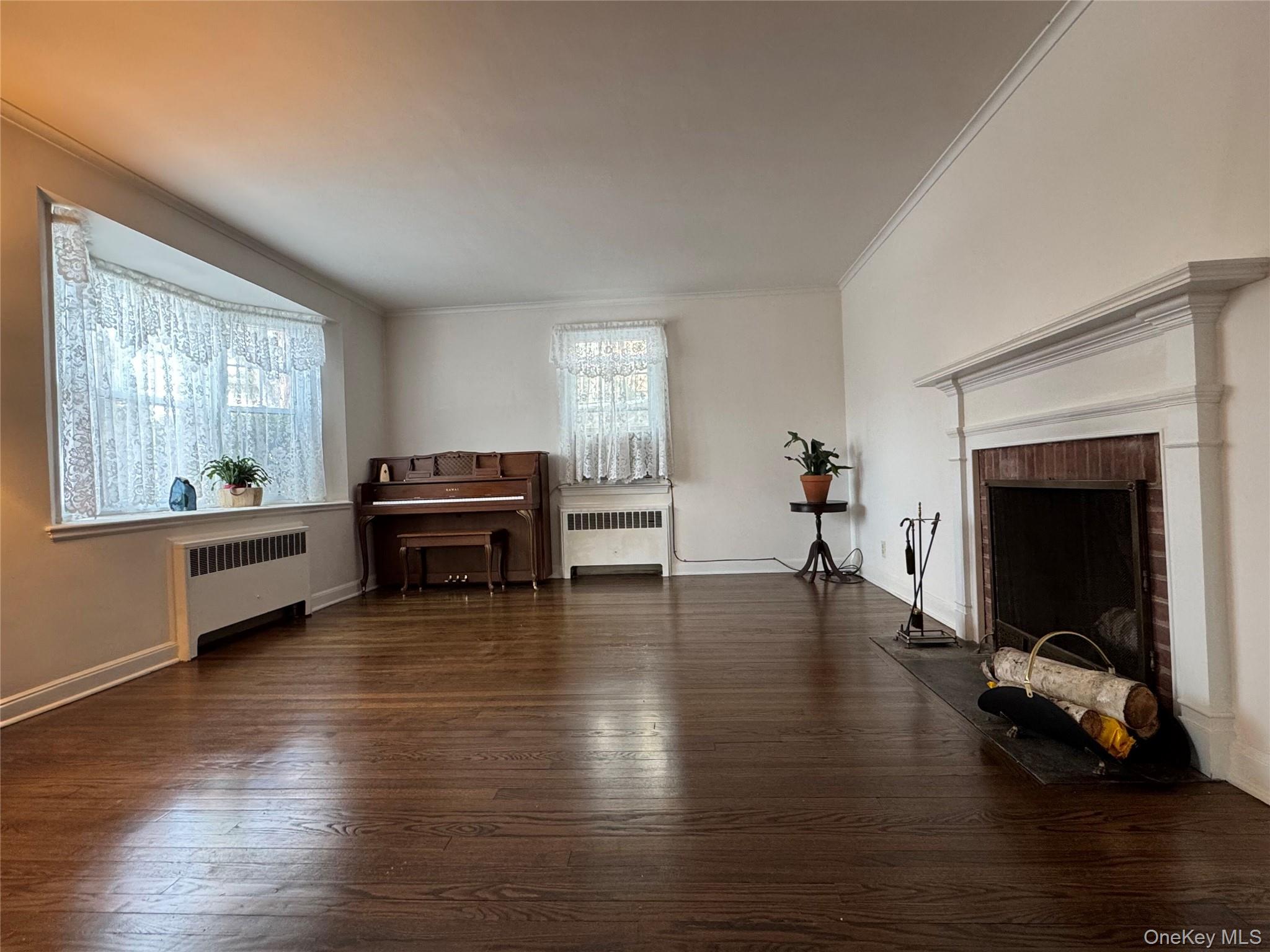 9 Valley Terrace Port Chester, NY 10573 - Photo 5 of 25 a living room with furniture and a fireplace