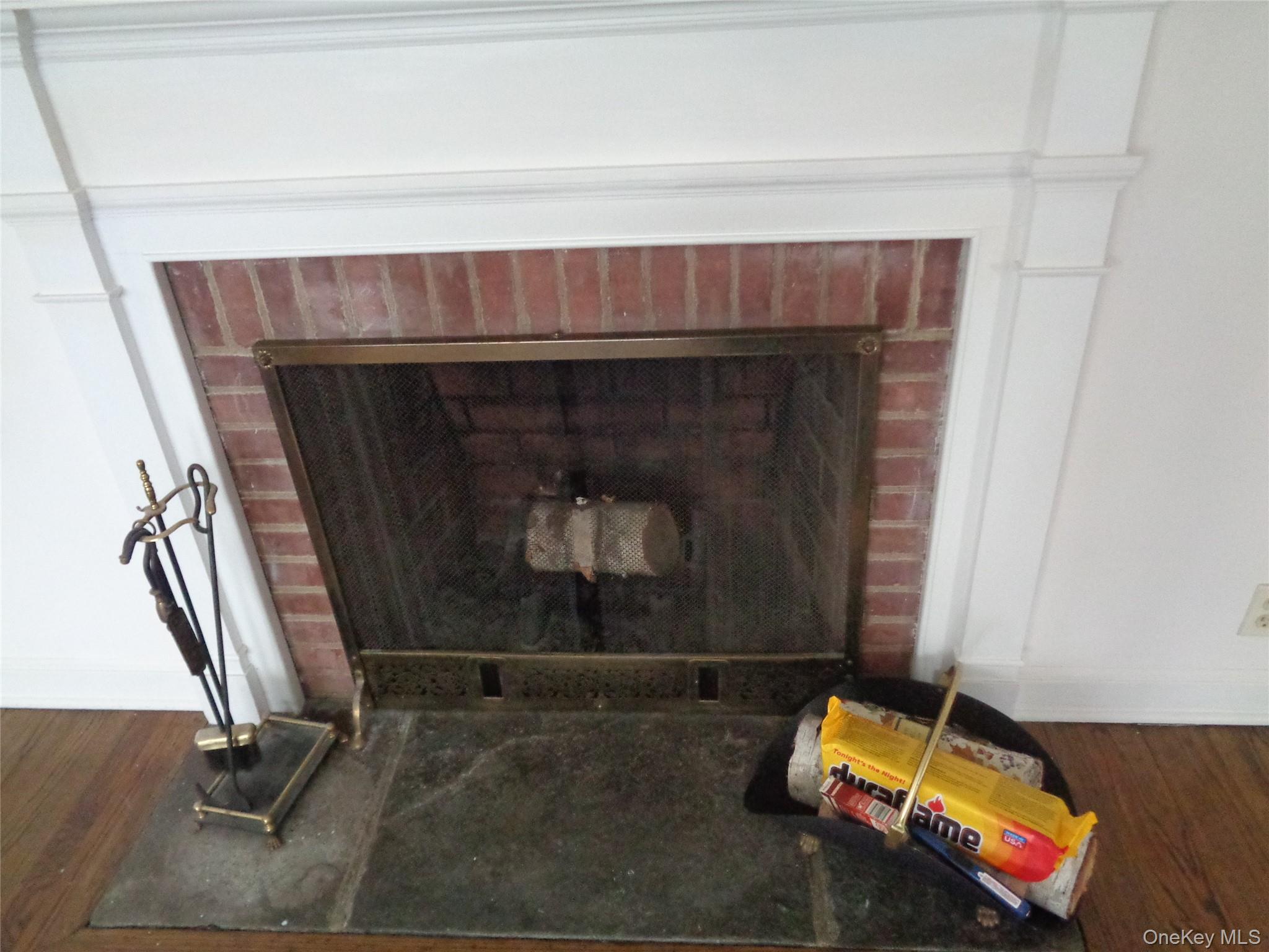 9 Valley Terrace Port Chester, NY 10573 - Photo 6 of 25 a room with a fireplace and gym equipment