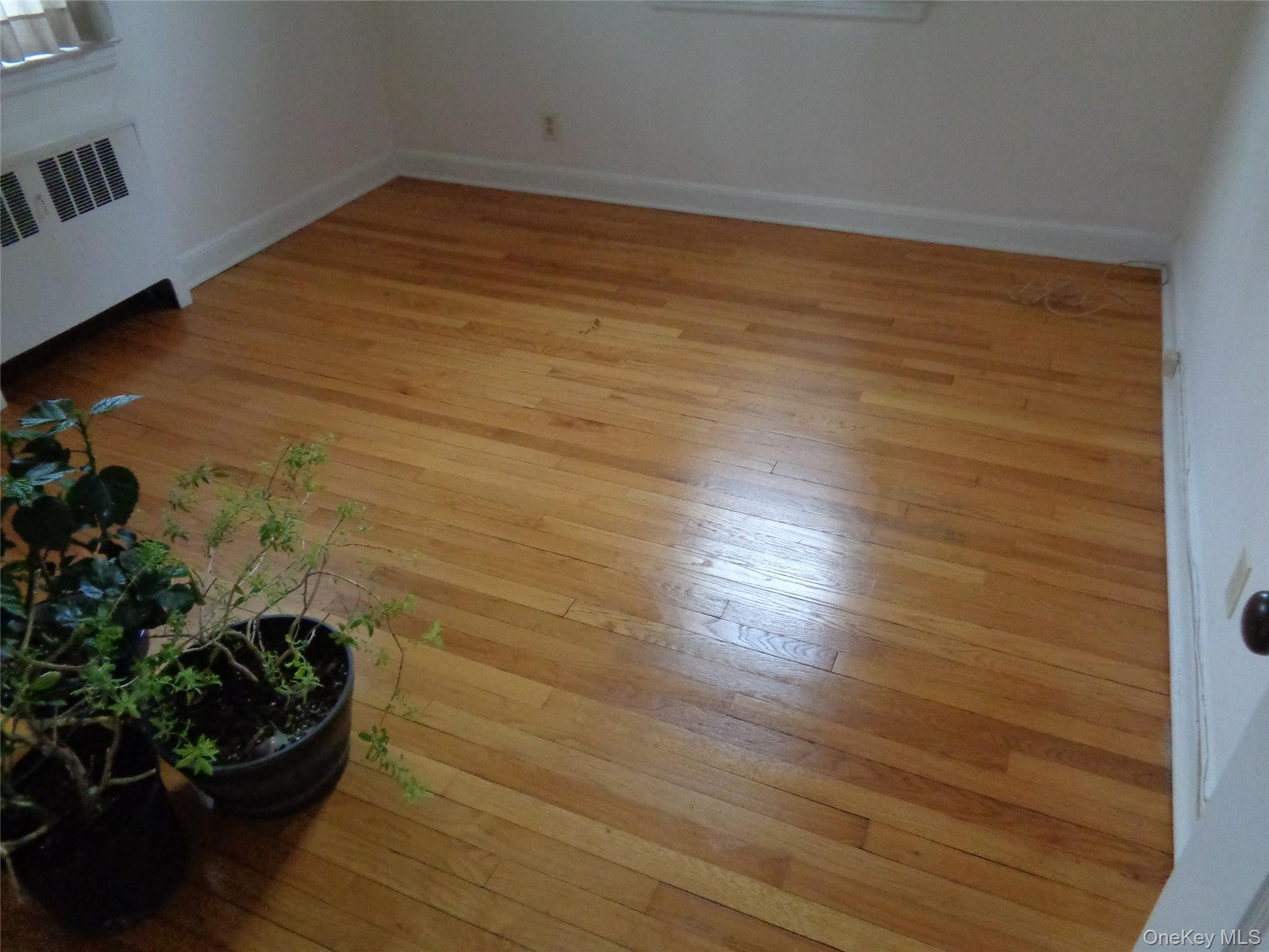 9 Valley Terrace Port Chester, NY 10573 - Photo 8 of 25 a view of a room with wooden floor