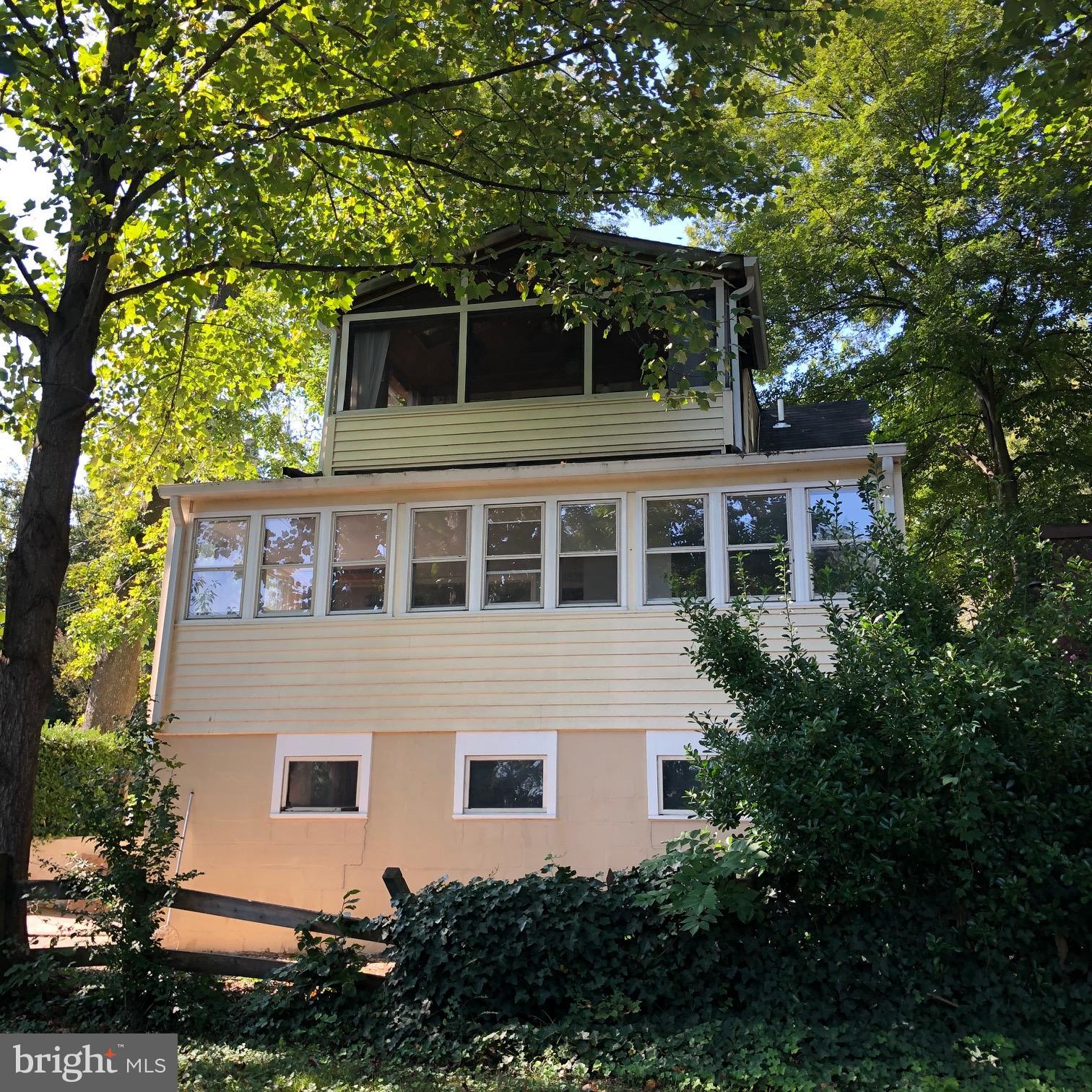 1540 Elm Road St. Leonard, MD 20685 - Photo 3 of 28 Sunroom and upstairs porch face the Bay!