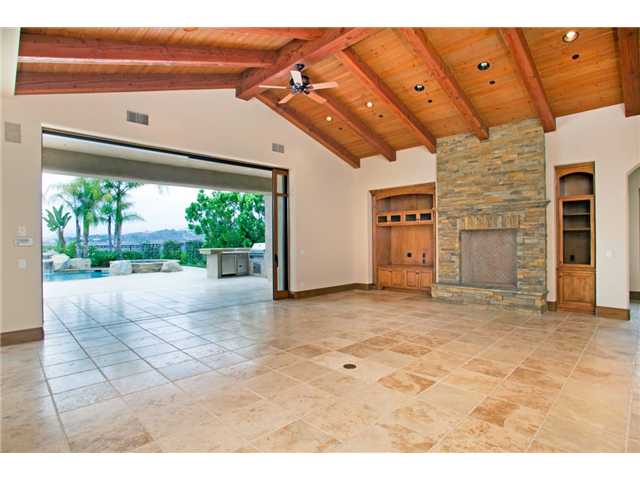 16559 Rd To Rio San Diego, CA 92127 - Photo 11 of 21 SEAMLESS TRANSITION FROM INDOOR TO OUTDOOR FAMILY ROOMS--EACH WITH FIREPLACE