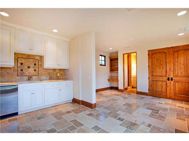 16559 Rd To Rio San Diego, CA 92127 - Photo 18 of 21 LARGE GUEST HOUSE WITH STONE FLOORS, FULL BATH AND WALK-UP SERVICE BAR