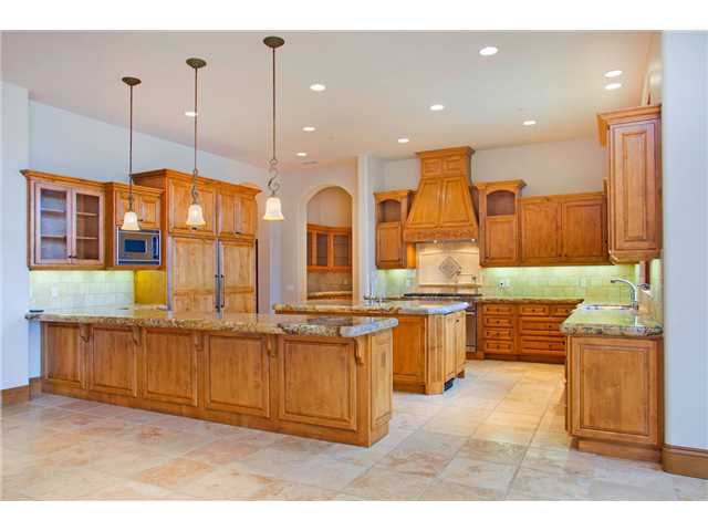 16559 Rd To Rio San Diego, CA 92127 - Photo 8 of 21 WELL APPOINTED KITCHEN AND BUTLER PANTRY WITH FURNITURE GRADE CABINETRY AND STAINLESS STEEL APPLIANCES!