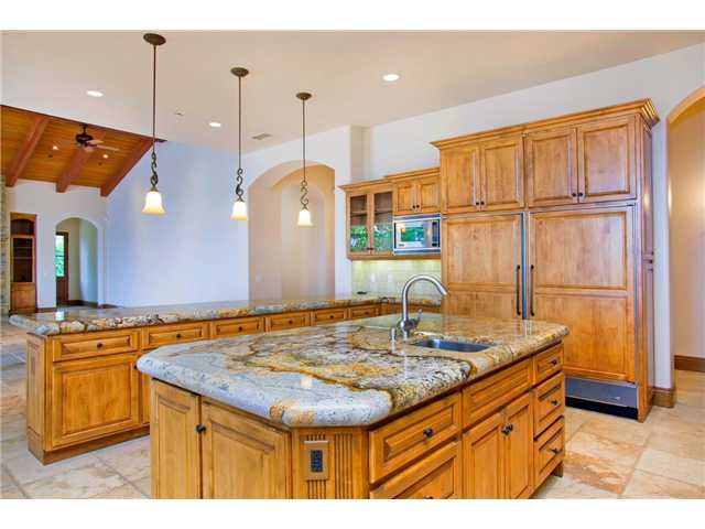 16559 Rd To Rio San Diego, CA 92127 - Photo 10 of 21 LONG PENINSULA FOR BAR SEATING AND CENTRAL ISLAND FOR CONVENIENCE