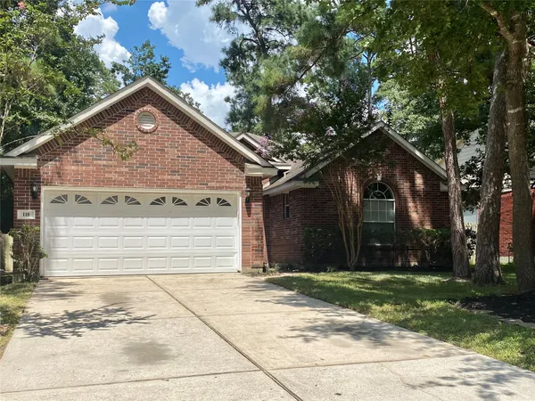 a view of a house with a small yard