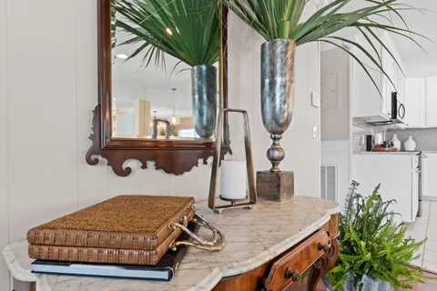 a kitchen with a sink and a counter top space