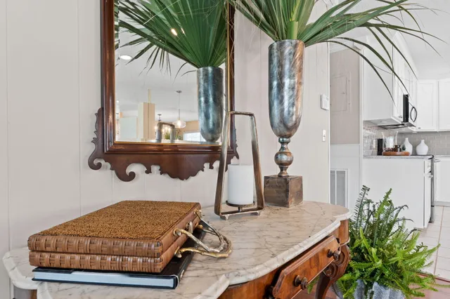 a kitchen with a sink and a counter top space