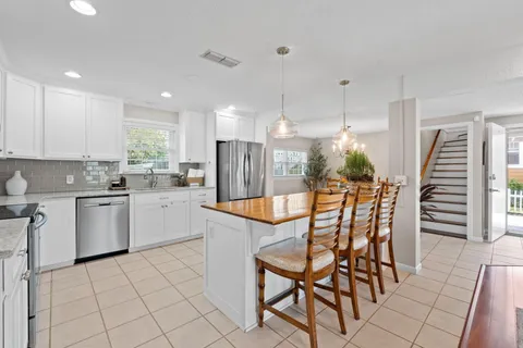 a view of a living room kitchen and living room