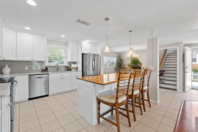 a view of a living room kitchen and living room