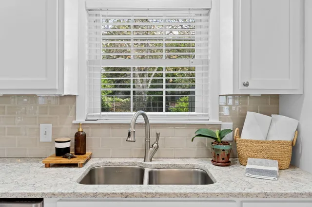 a view of a hallway with washer and dryer