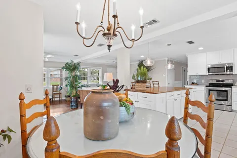 a bathroom with a shower and a mirror