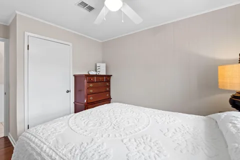 a bathroom with a granite countertop sink a vanity and a mirror