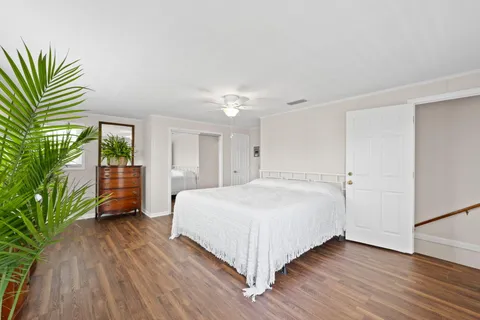 a bathroom with a shower and toilet