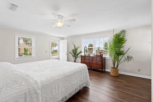 a view of a balcony with wooden floor