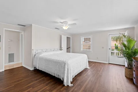 a view of a chairs and tables in the balcony