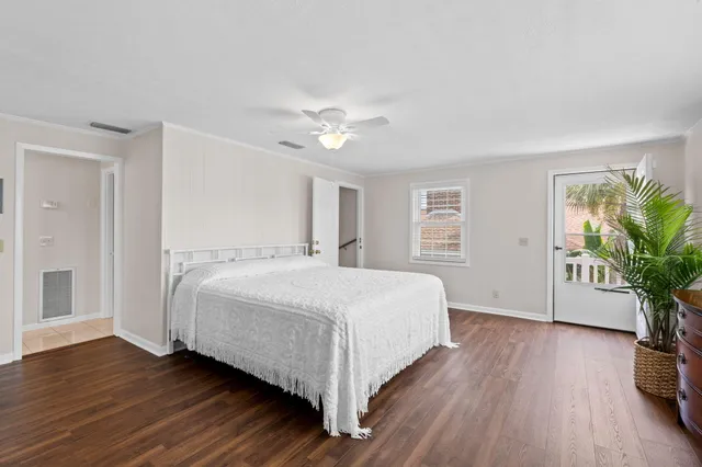a view of a chairs and tables in the balcony
