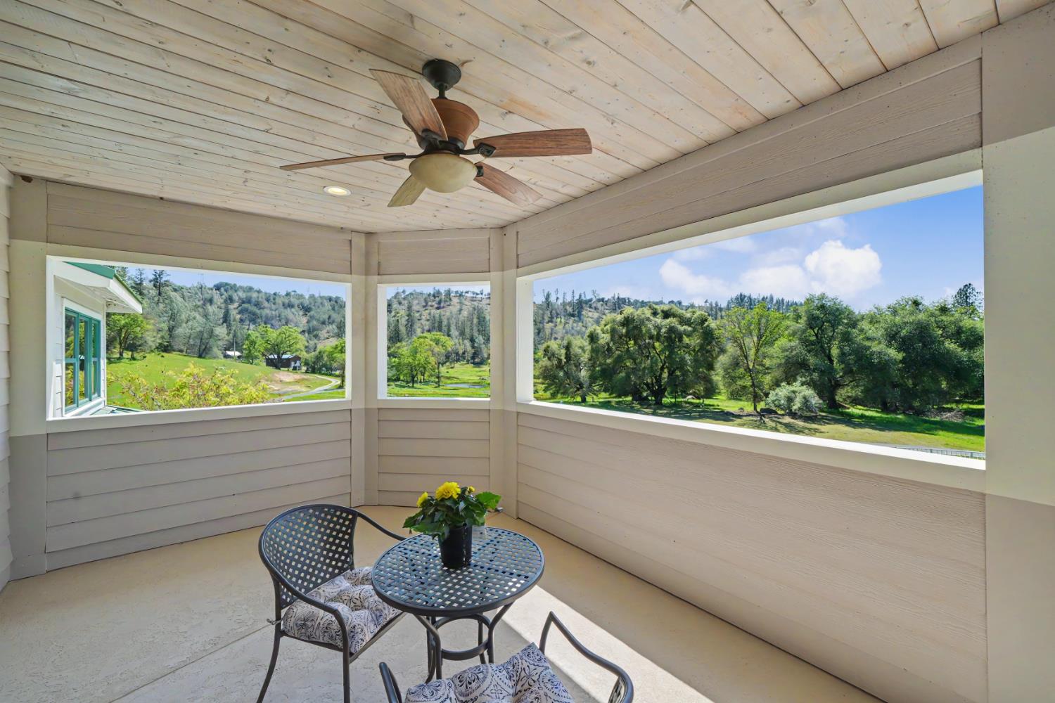 22930 Meadow View Road Fiddletown, CA 95629 - Photo 46 of 95 a view of a dining room with furniture window and outside view