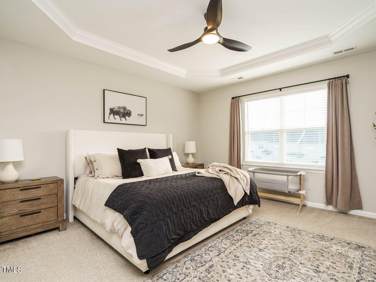 106 Zante Currant Road Durham, NC 27703 - Photo 17 of 27 a bed room with a bed and a large window