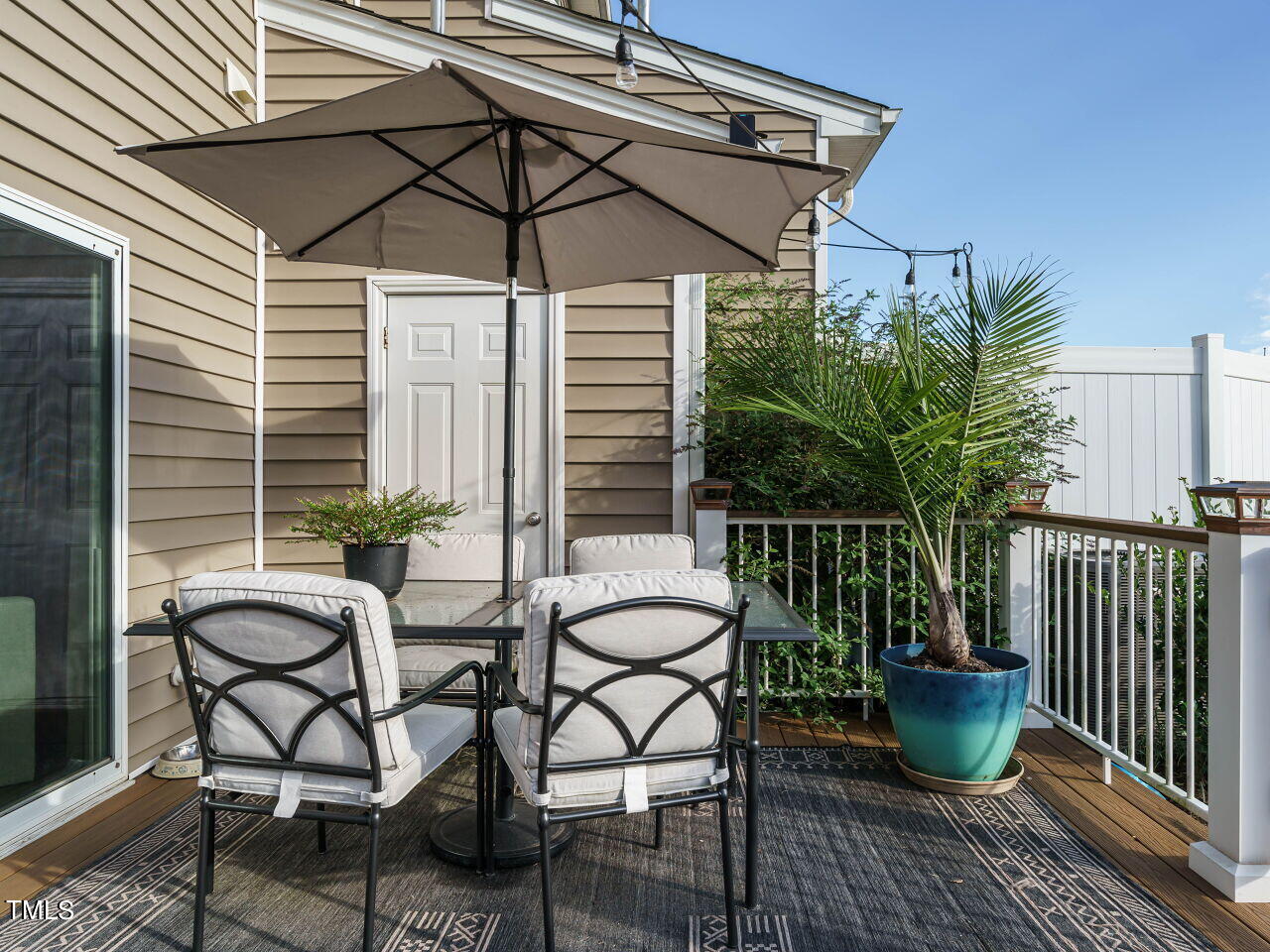 106 Zante Currant Road Durham, NC 27703 - Photo 26 of 27 a view of a chair and table in the balcony