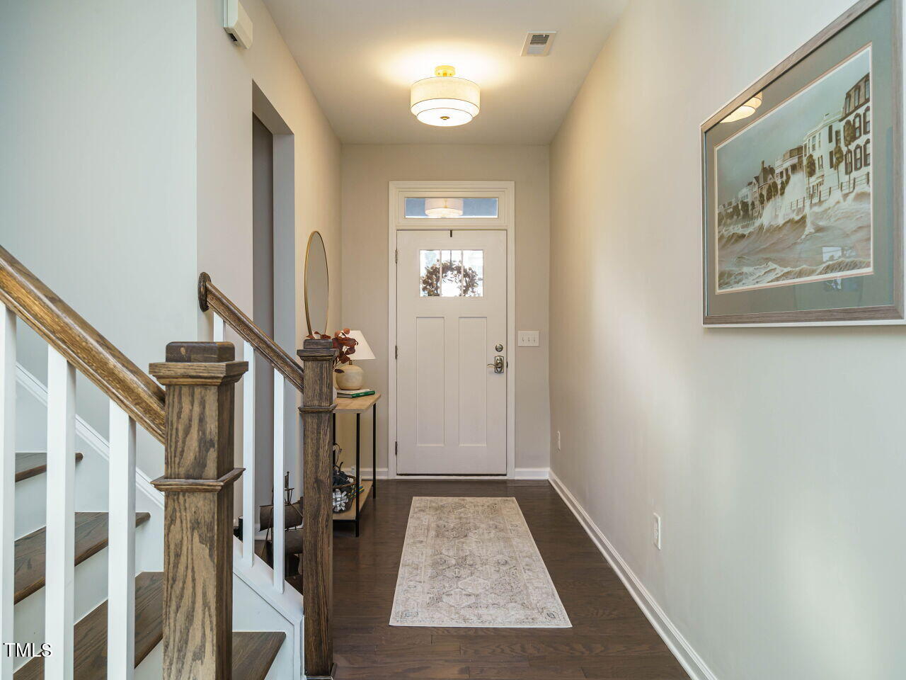 106 Zante Currant Road Durham, NC 27703 - Photo 3 of 27 a view of hallway with wooden floor