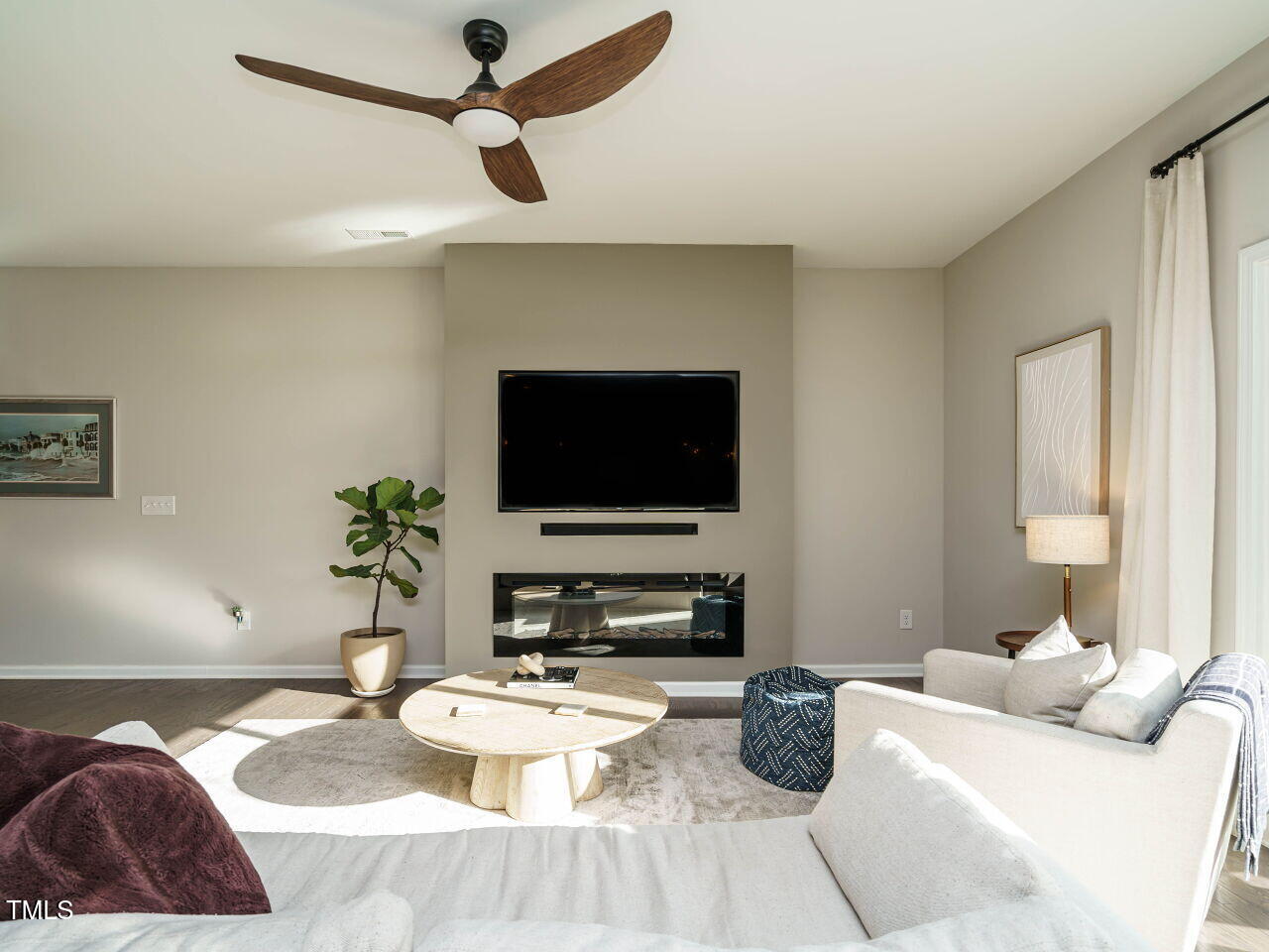 106 Zante Currant Road Durham, NC 27703 - Photo 8 of 27 a bedroom with a bed and a flat screen tv