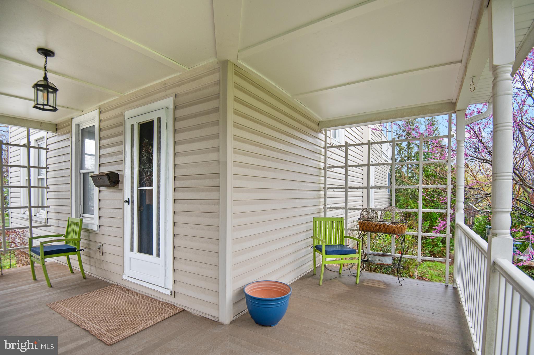 409 East Main Street Westminster, MD 21157 - Photo 2 of 46 a view of a chairs and table in a balcony