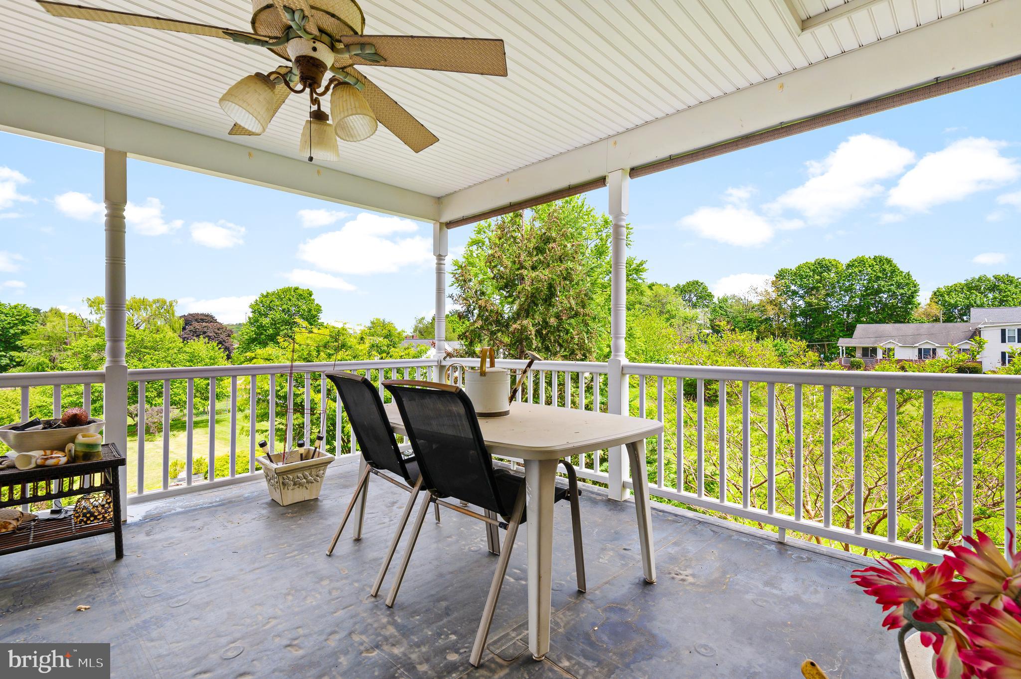 409 East Main Street Westminster, MD 21157 - Photo 31 of 46 a view of a balcony with chairs and a table