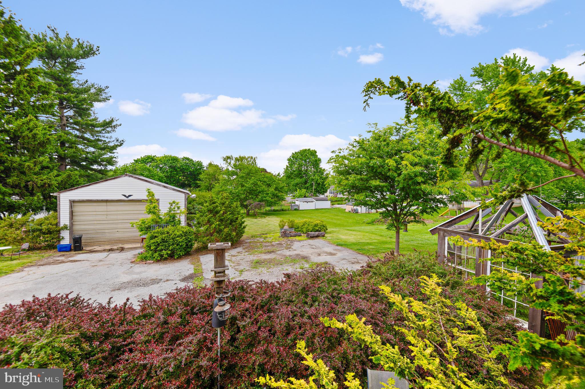 409 East Main Street Westminster, MD 21157 - Photo 33 of 46 a view of a street with a house in the background