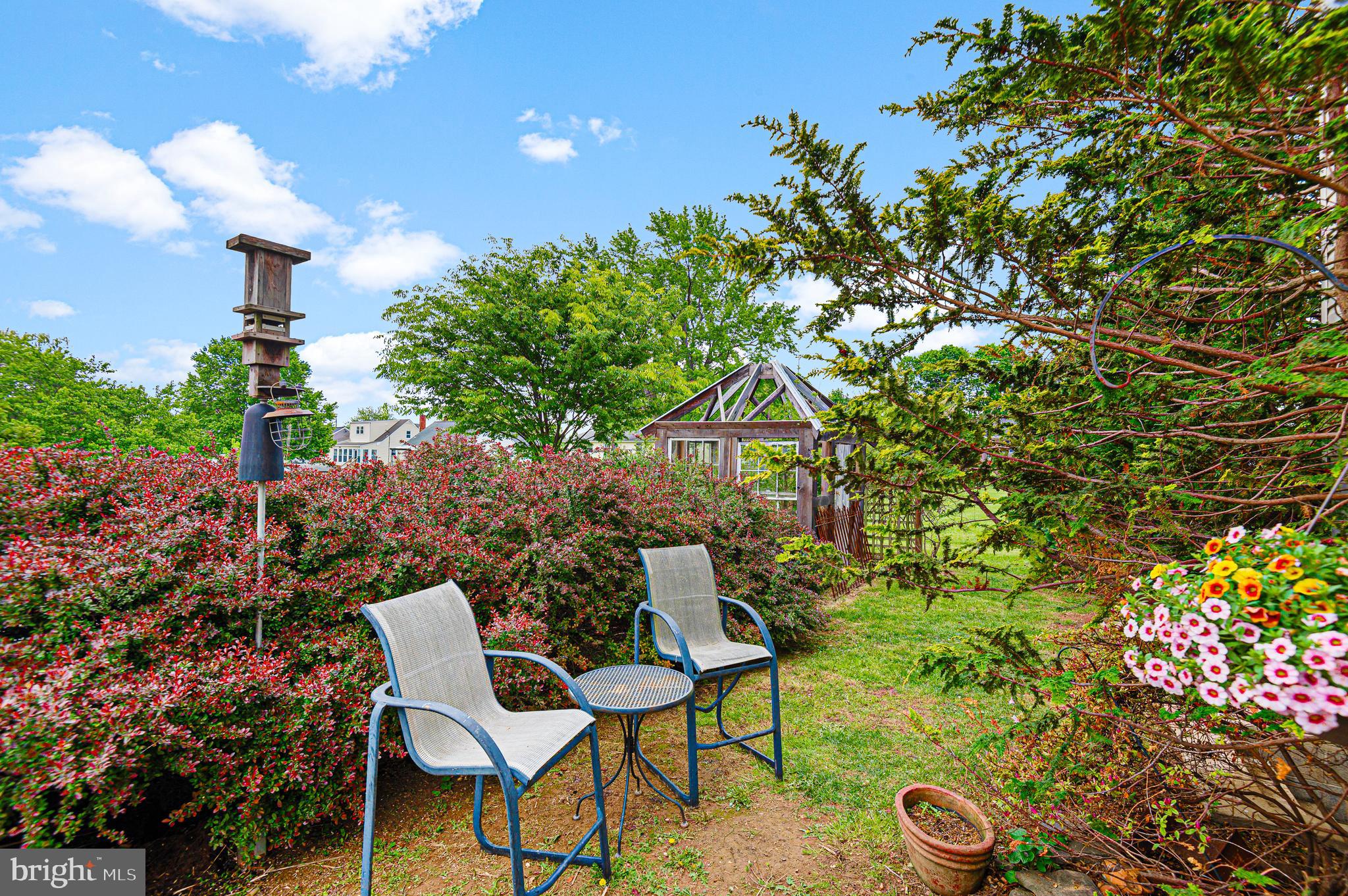409 East Main Street Westminster, MD 21157 - Photo 34 of 46 a front view of a house with garden