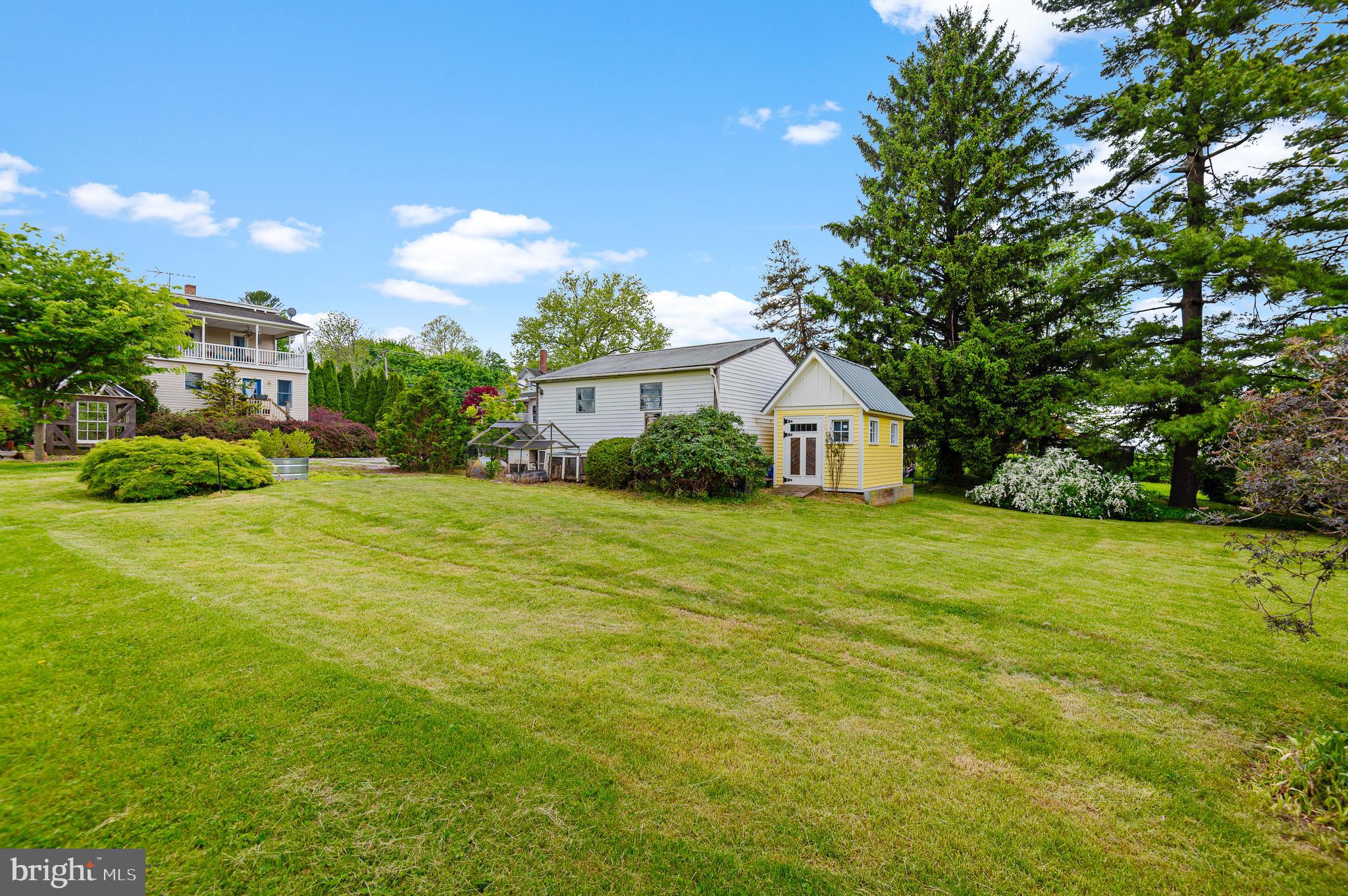 409 East Main Street Westminster, MD 21157 - Photo 37 of 46 a house view with a garden space