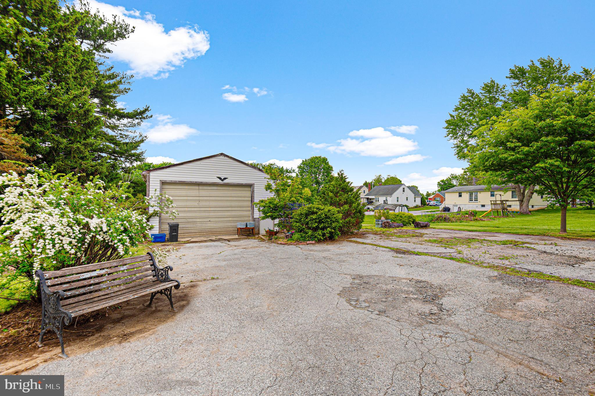 409 East Main Street Westminster, MD 21157 - Photo 40 of 46 a house view with a garden space