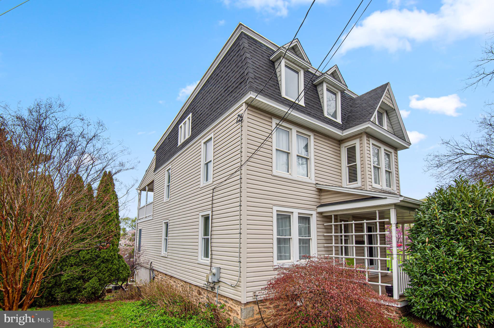 409 East Main Street Westminster, MD 21157 - Photo 41 of 46 a view of a house with a yard and plants