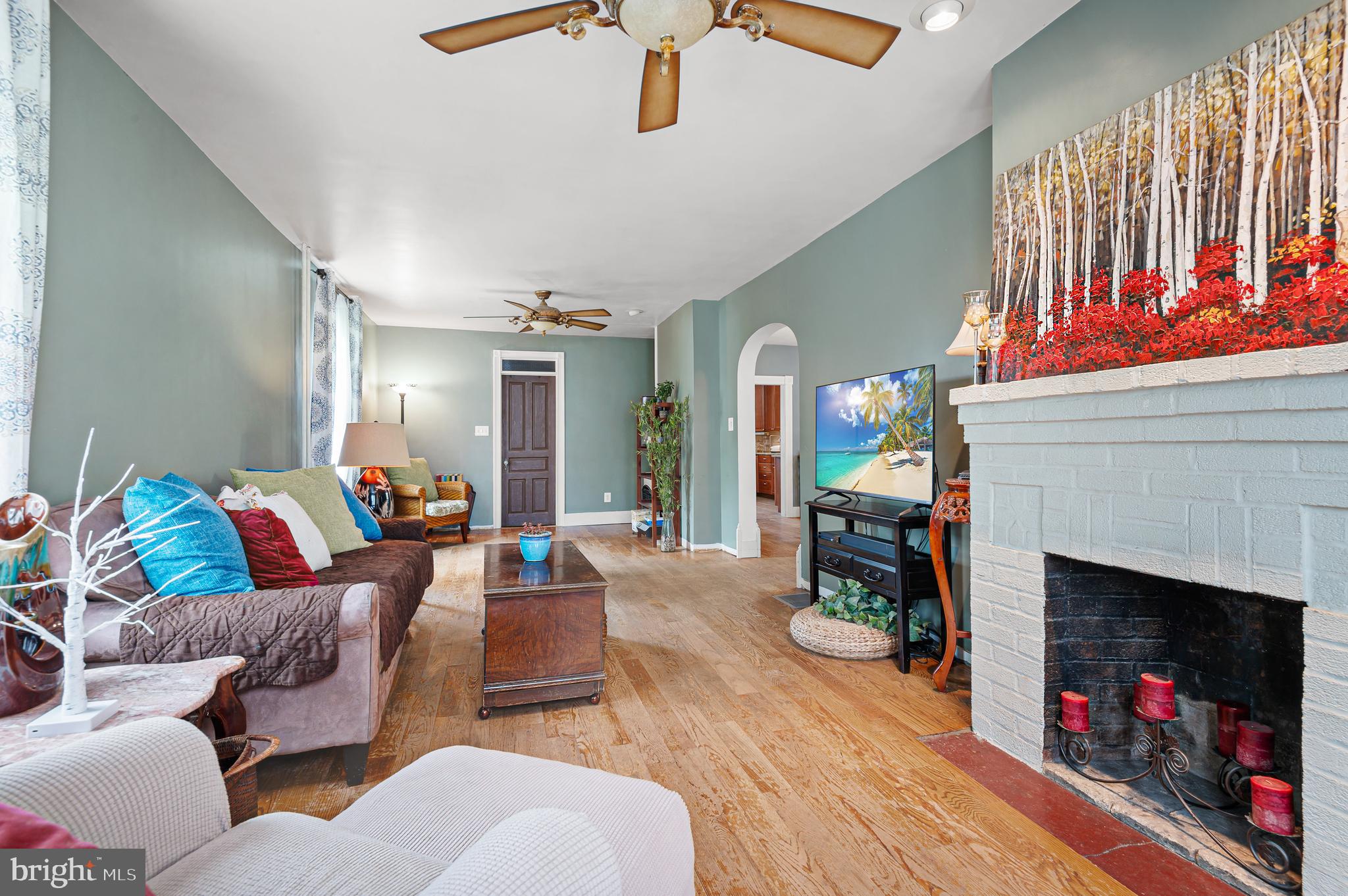 409 East Main Street Westminster, MD 21157 - Photo 5 of 46 a living room with furniture and a fireplace