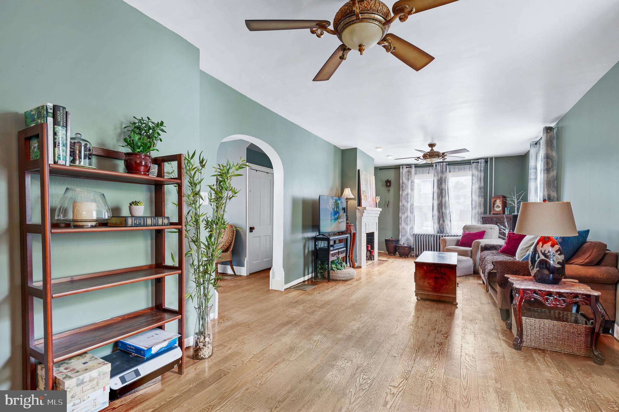 409 East Main Street Westminster, MD 21157 - Photo 10 of 46 a living room with furniture and wooden floor