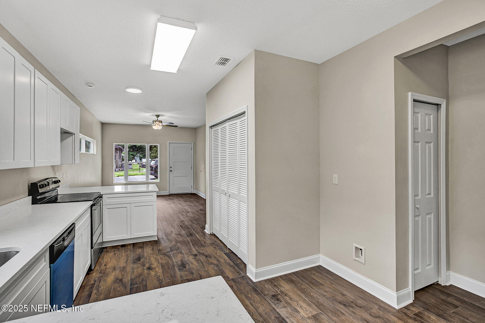 2291 Clemente Drive Jacksonville, FL 32204 - Photo 11 of 20 a kitchen with a refrigerator sink and stove