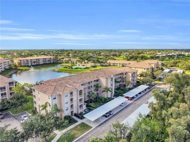 an aerial view of residential building and lake view