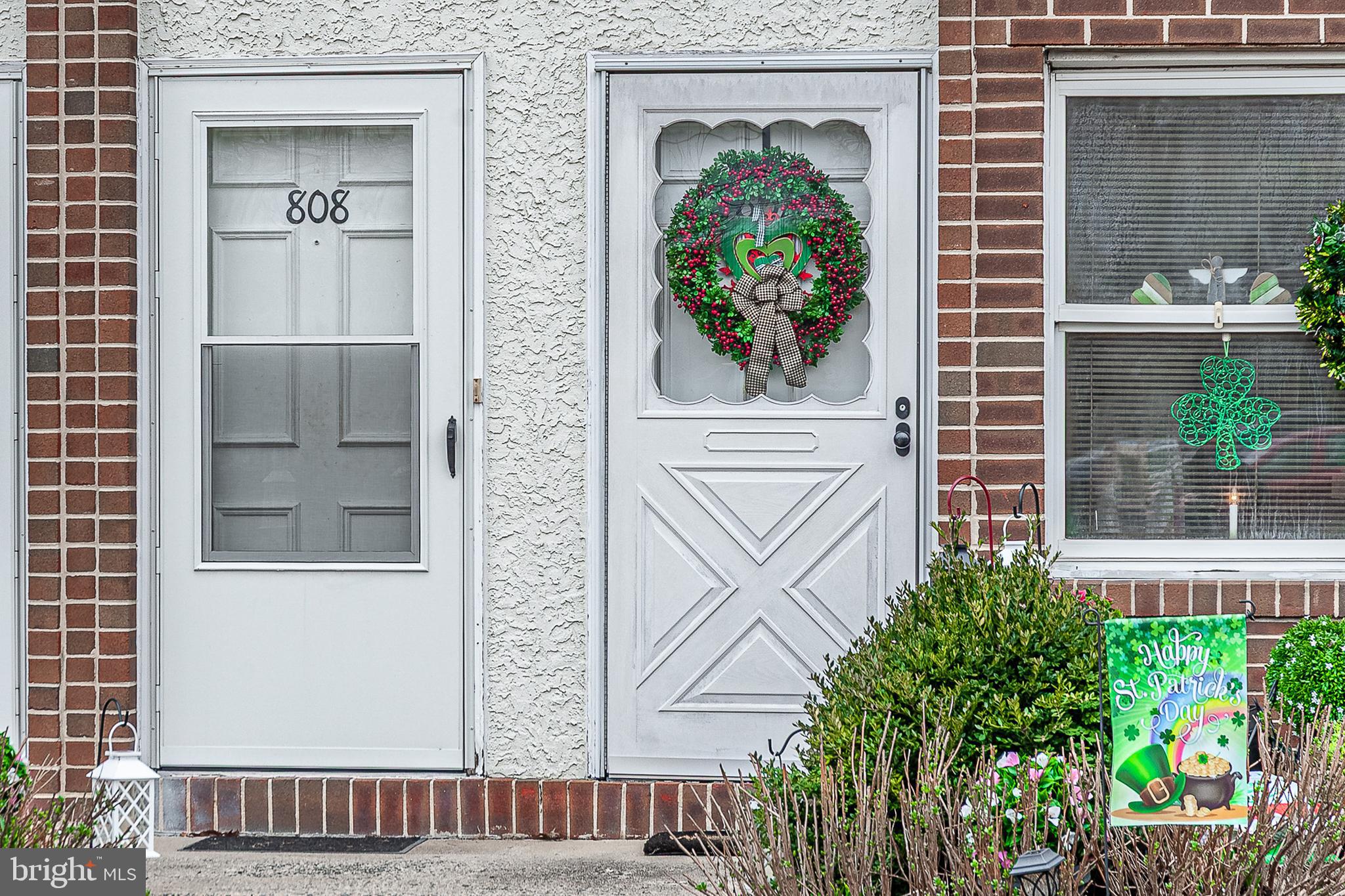 808 Winding Way Westville, NJ 08093 - Photo 3 of 14 a front view of a house with potted plants
