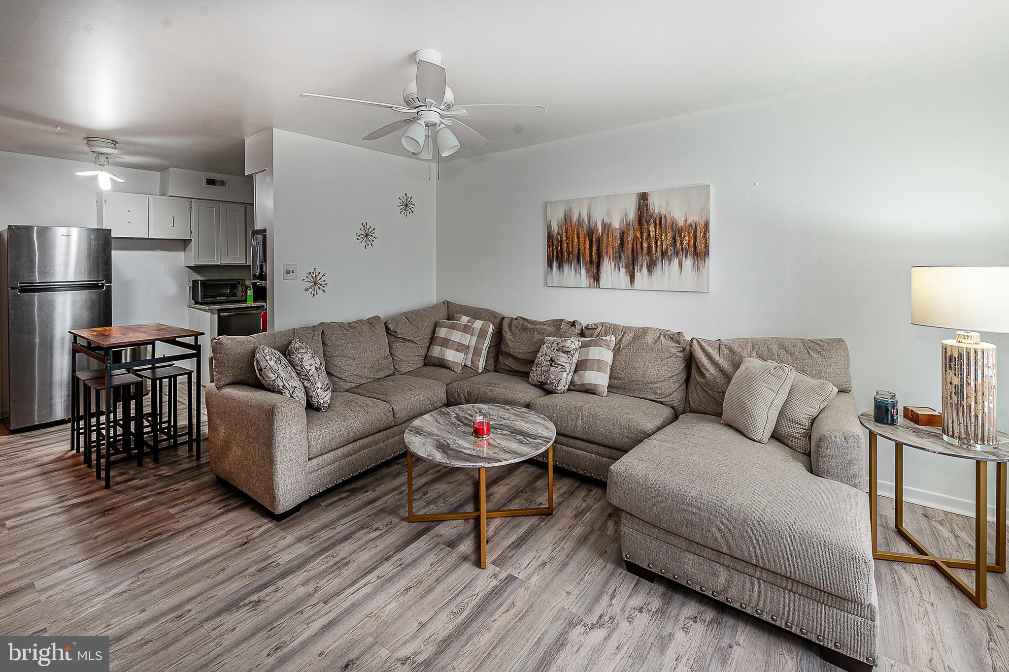 808 Winding Way Westville, NJ 08093 - Photo 5 of 14 a living room with furniture and wooden floor