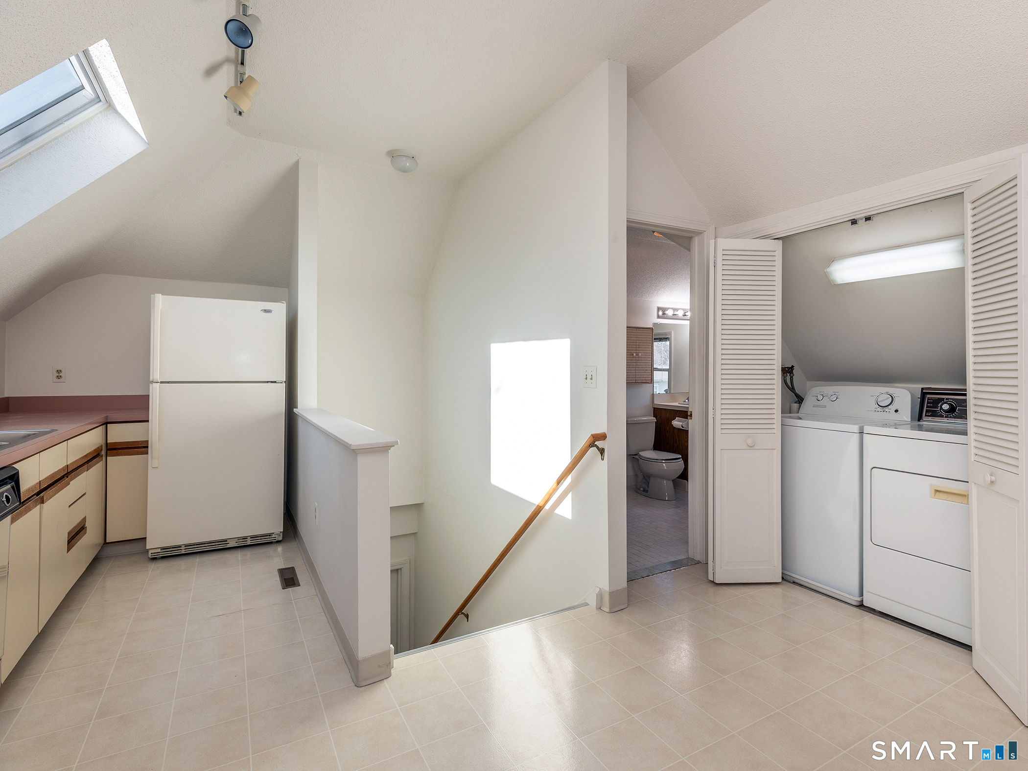 68 Wilson Avenue, Unit 105 Torrington, CT 06790 - Photo 13 of 24 a view of a kitchen with storage and utility room