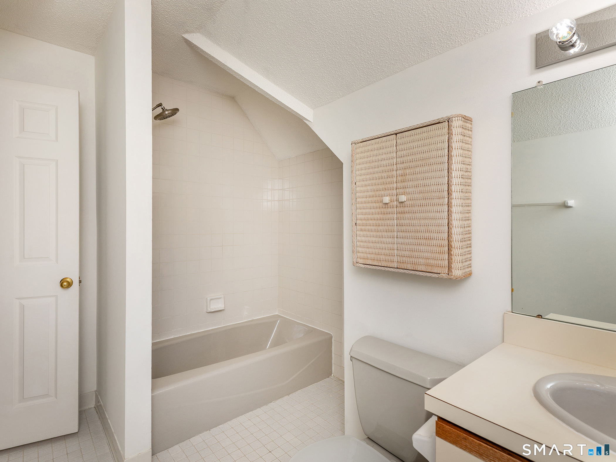 68 Wilson Avenue, Unit 105 Torrington, CT 06790 - Photo 16 of 24 a bathroom with a sink toilet and shower