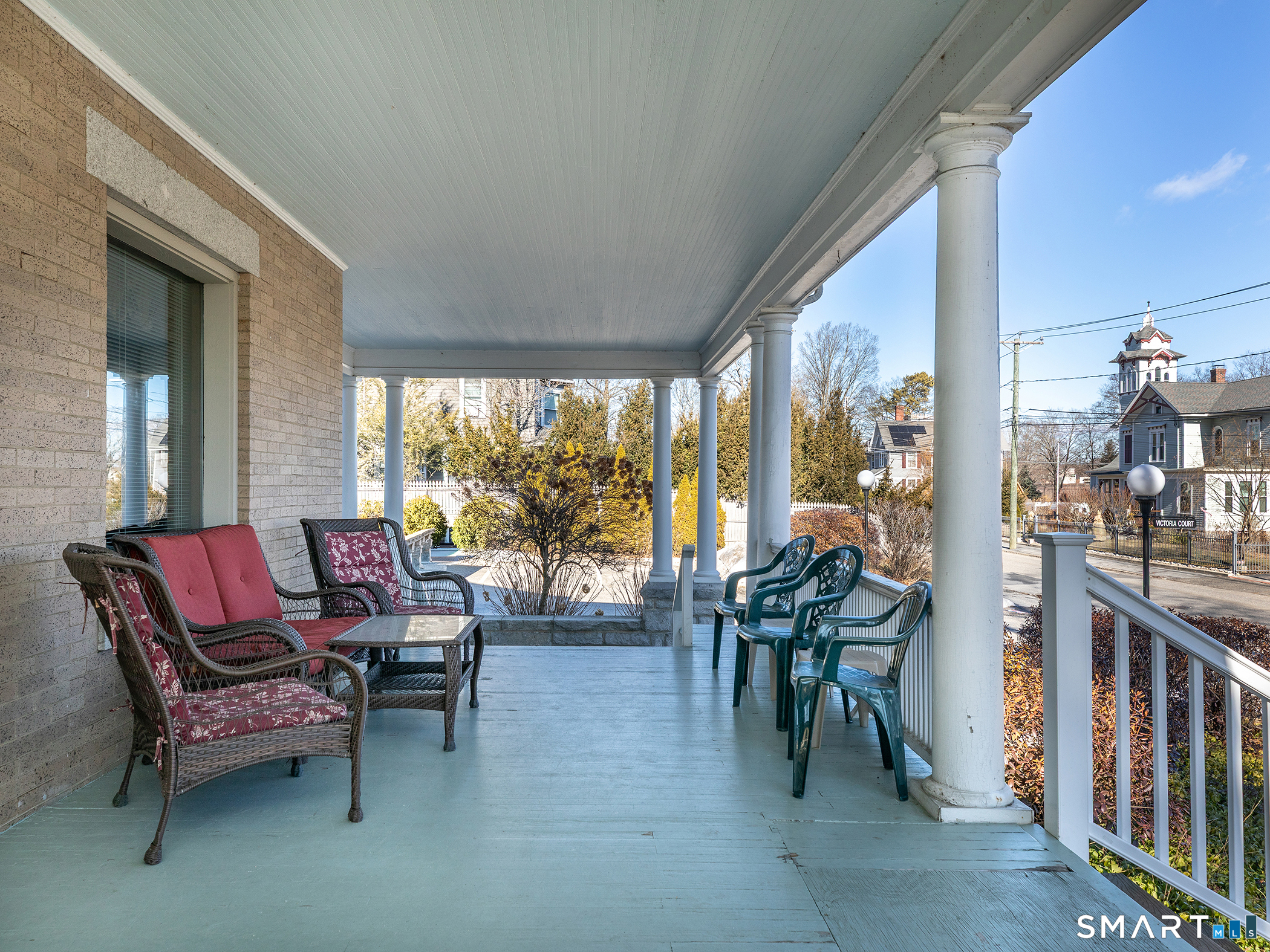 68 Wilson Avenue, Unit 105 Torrington, CT 06790 - Photo 21 of 24 a view of a big room with furniture and balcony