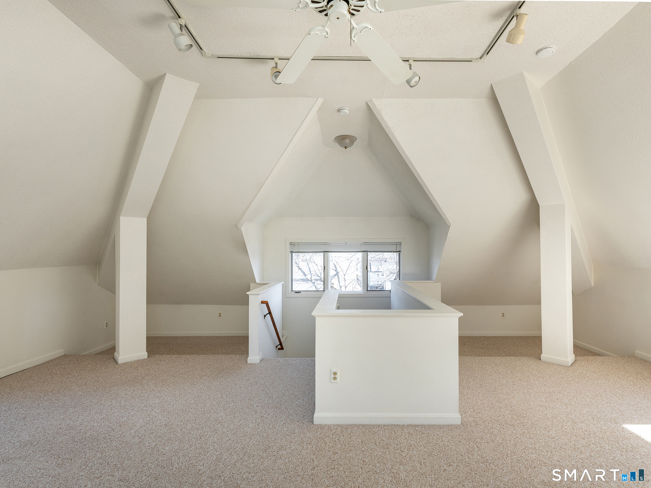 68 Wilson Avenue, Unit 105 Torrington, CT 06790 - Photo 4 of 24 a view of a livingroom with a washer and dryer
