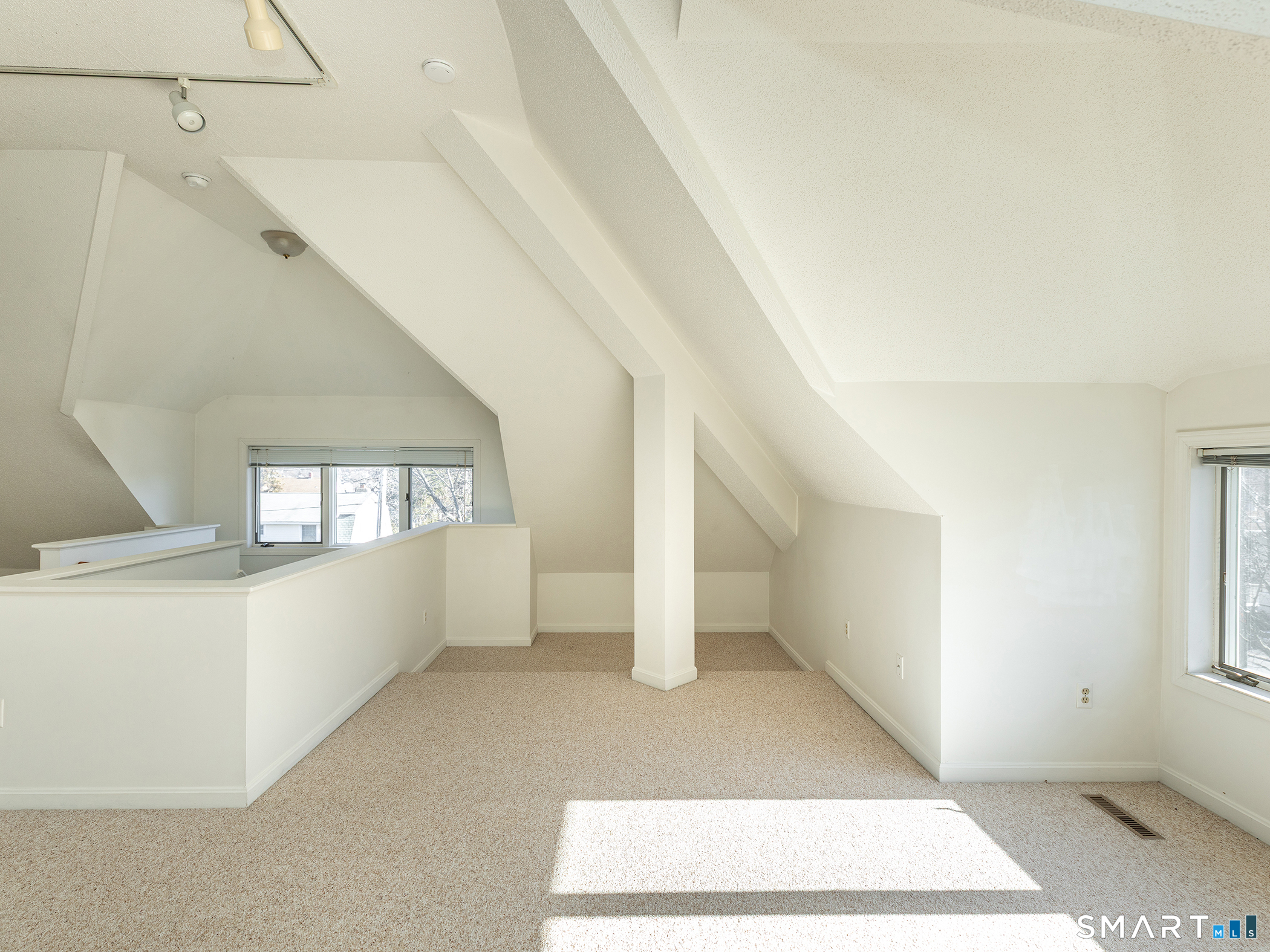 68 Wilson Avenue, Unit 105 Torrington, CT 06790 - Photo 7 of 24 a view of an empty room and window