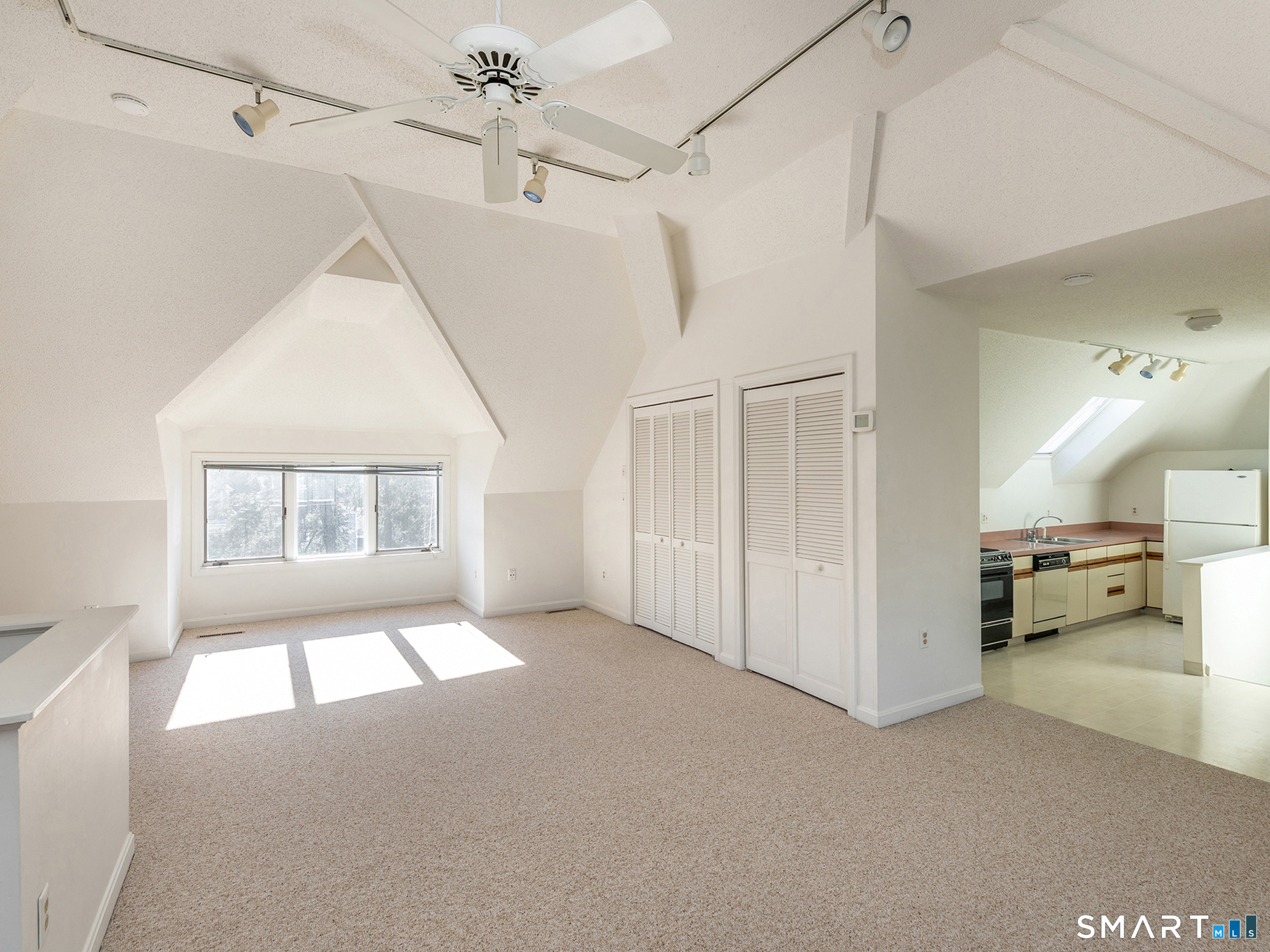 68 Wilson Avenue, Unit 105 Torrington, CT 06790 - Photo 9 of 24 a view of empty room with windows