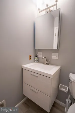 a bathroom with a sink and a vanity