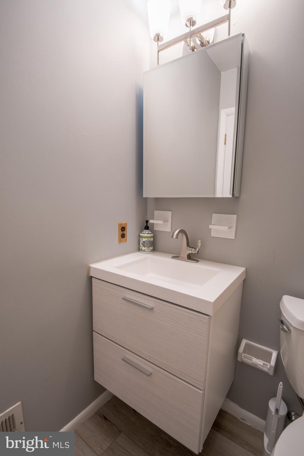 617 St Anthony Lane Upper Darby, PA 19082 - Photo 18 of 26 a bathroom with a sink and a vanity